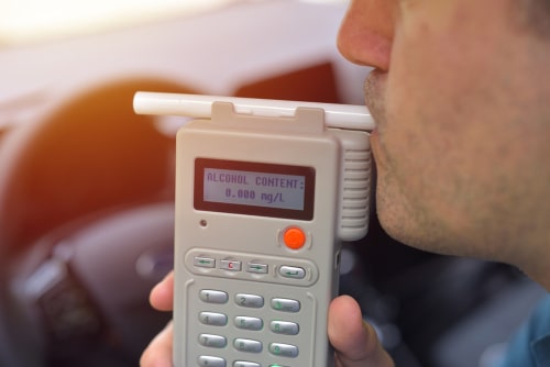 you should comply with the police officer's request of giving a breath test
